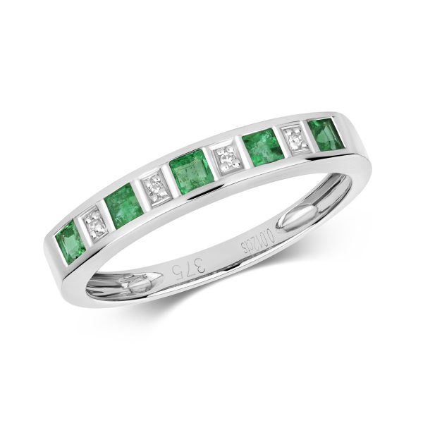 9 carat white gold diamond and emerald eternity ring