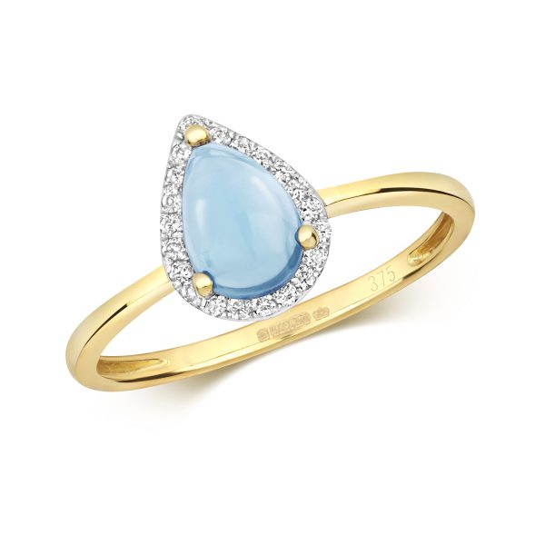 9 carat yellow go.d cabochon blue topaz and diamond ring pear shape